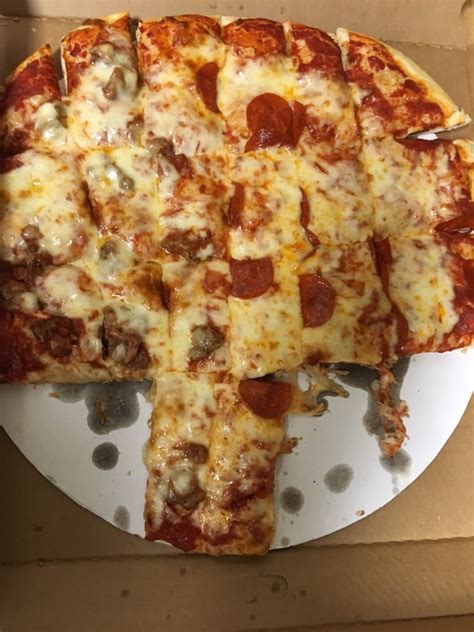 Scatchell's beef & pizza - I purchased a beef, beverage and a 16 inch cheese and sausage pizza. However, was given a beef and one slice of pizza. Then the older white male at the register started taking another customer order. I politely said excuse me I ordered a 16 inch pizza not a slice and I was totally ignored.